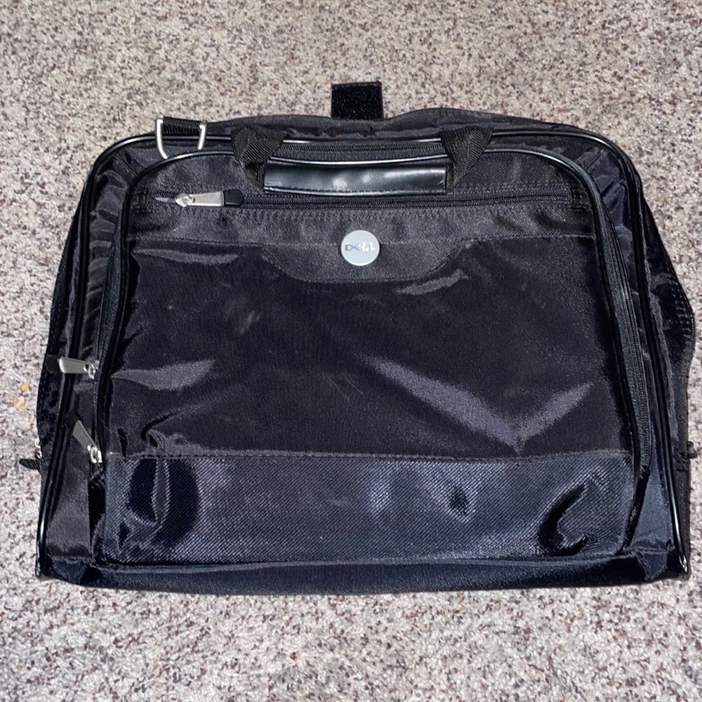 Dell black 3 pocket computer bag.
